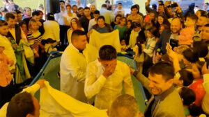People being baptised