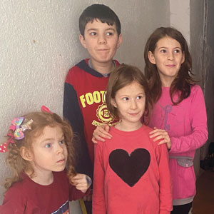 A family receive food in North Macedonia.