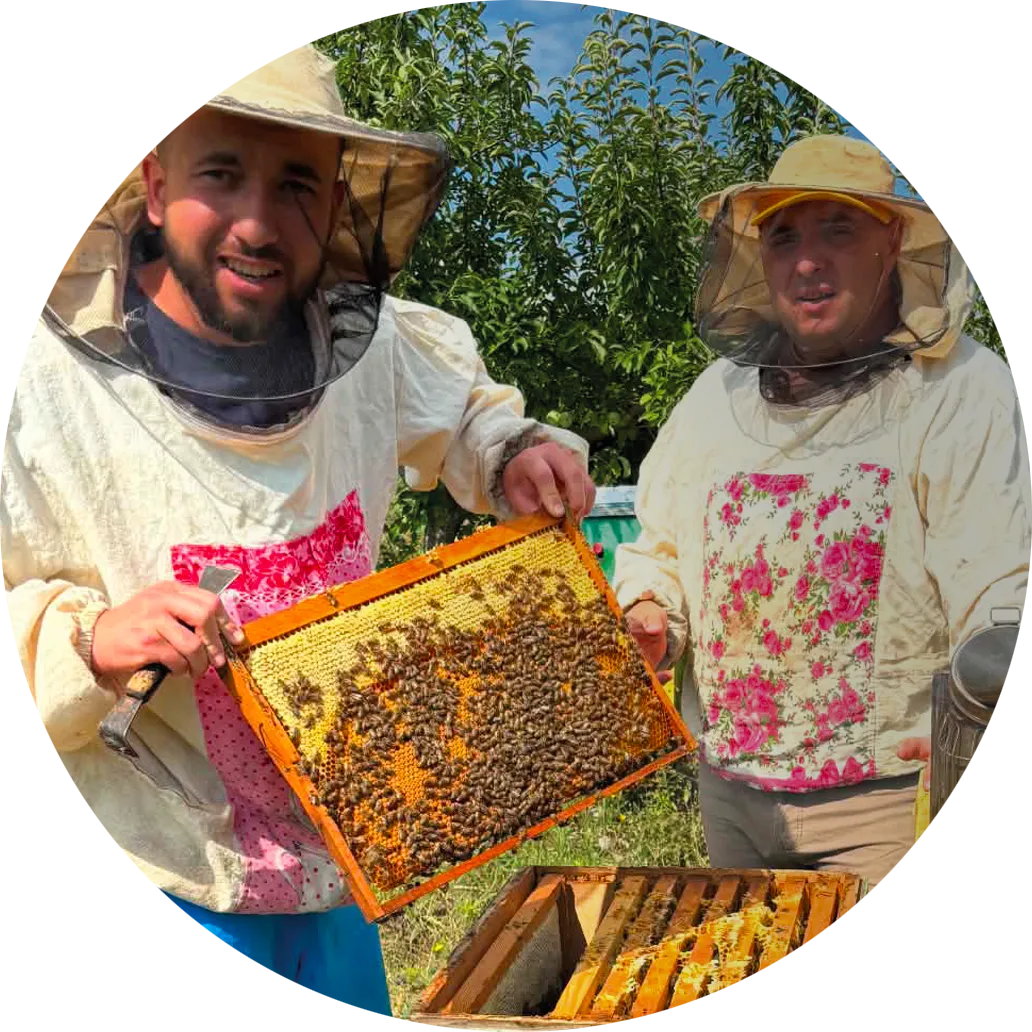 Bee-Keepers Marius and Andrei at the apiary
